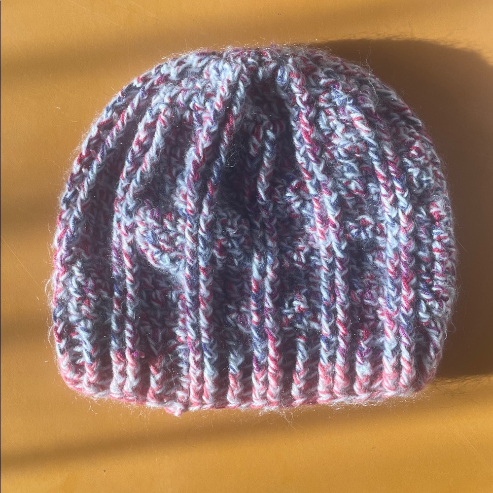 Fluffy blue, purple, and pink beanie